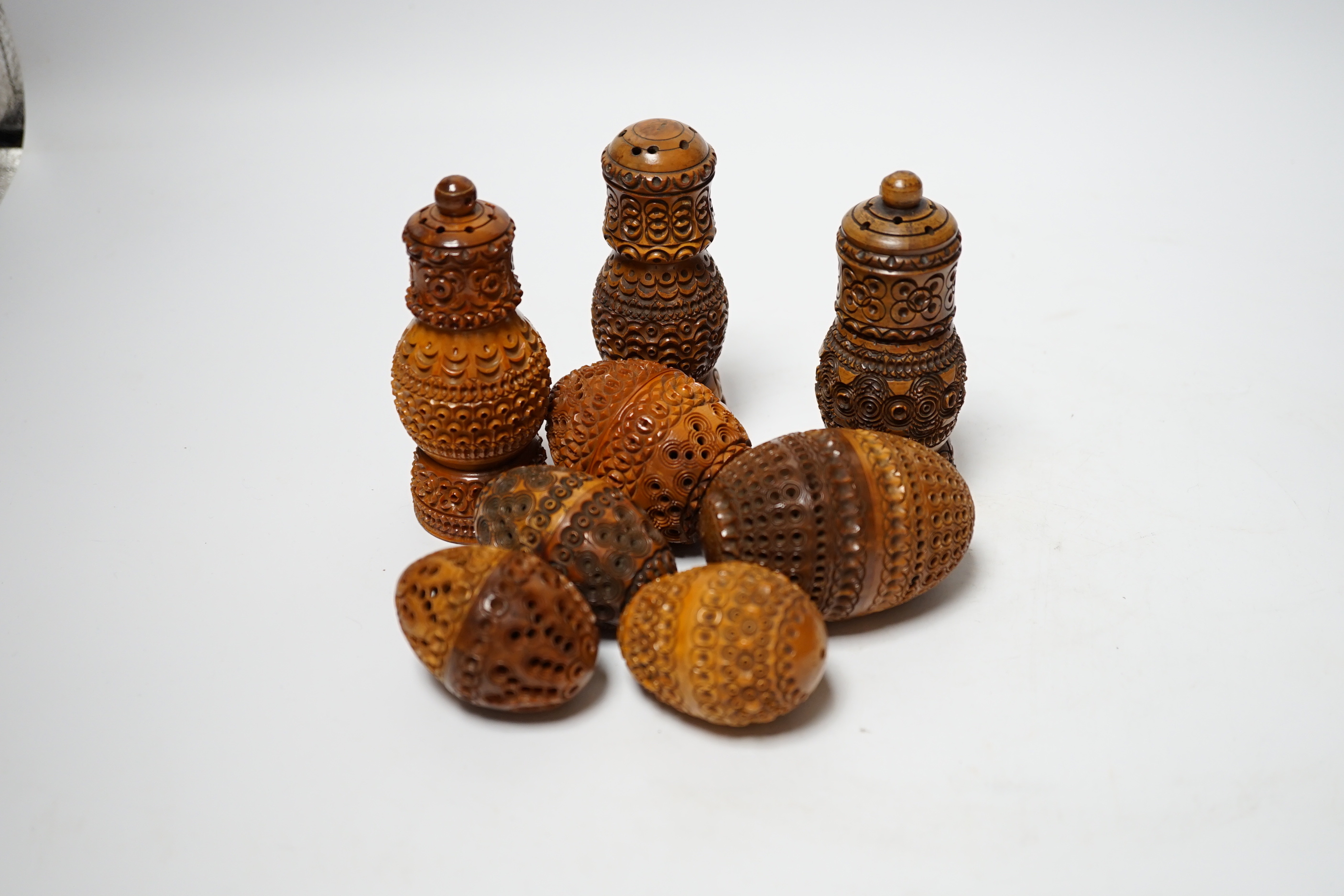 A quantity of coquilla nut carvings (8)